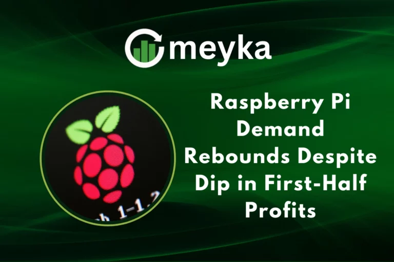 Raspberry Pi single-board computer with chips and components on display.