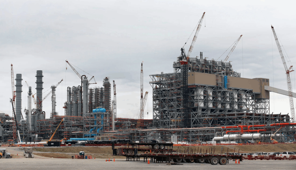 Bloomberg Source: A large industrial plant with cranes is under construction.